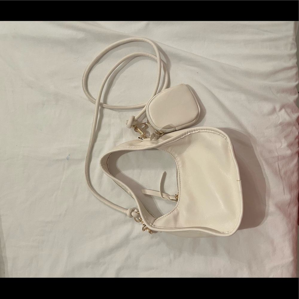 White mini purse with extra strap